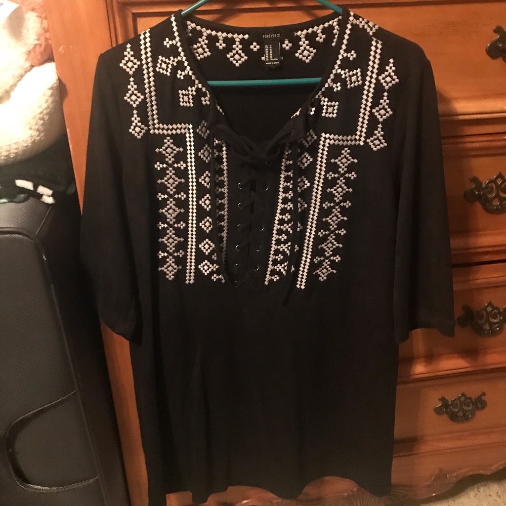 Black faux suede dress with tie detail in front!
